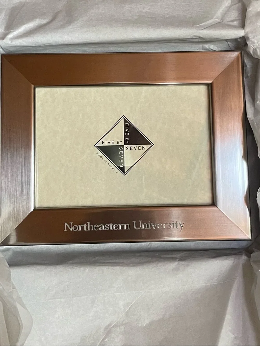 Northeastern University holds 5”x7”